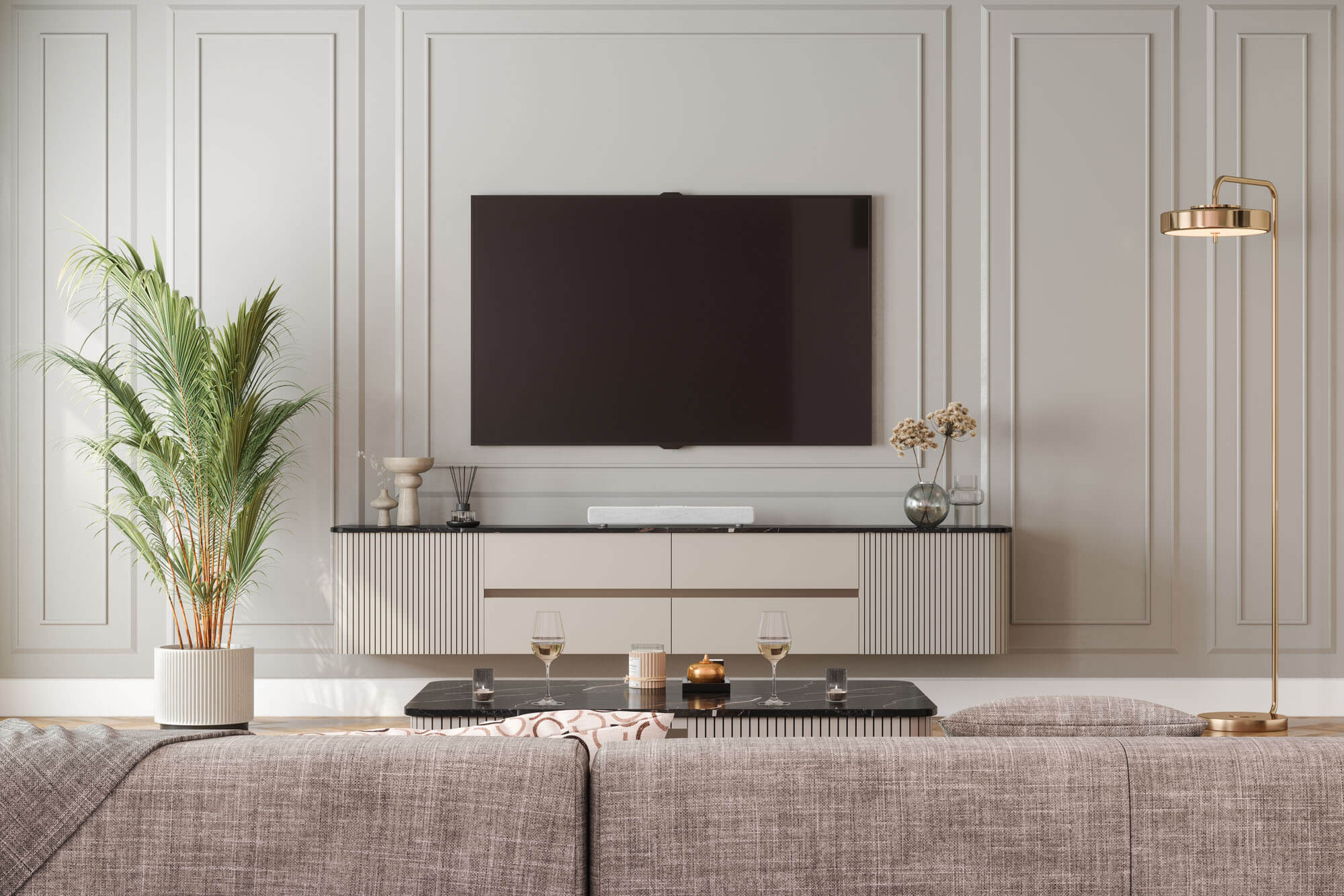 A large flat screen TV mounted on the wall in a living room.