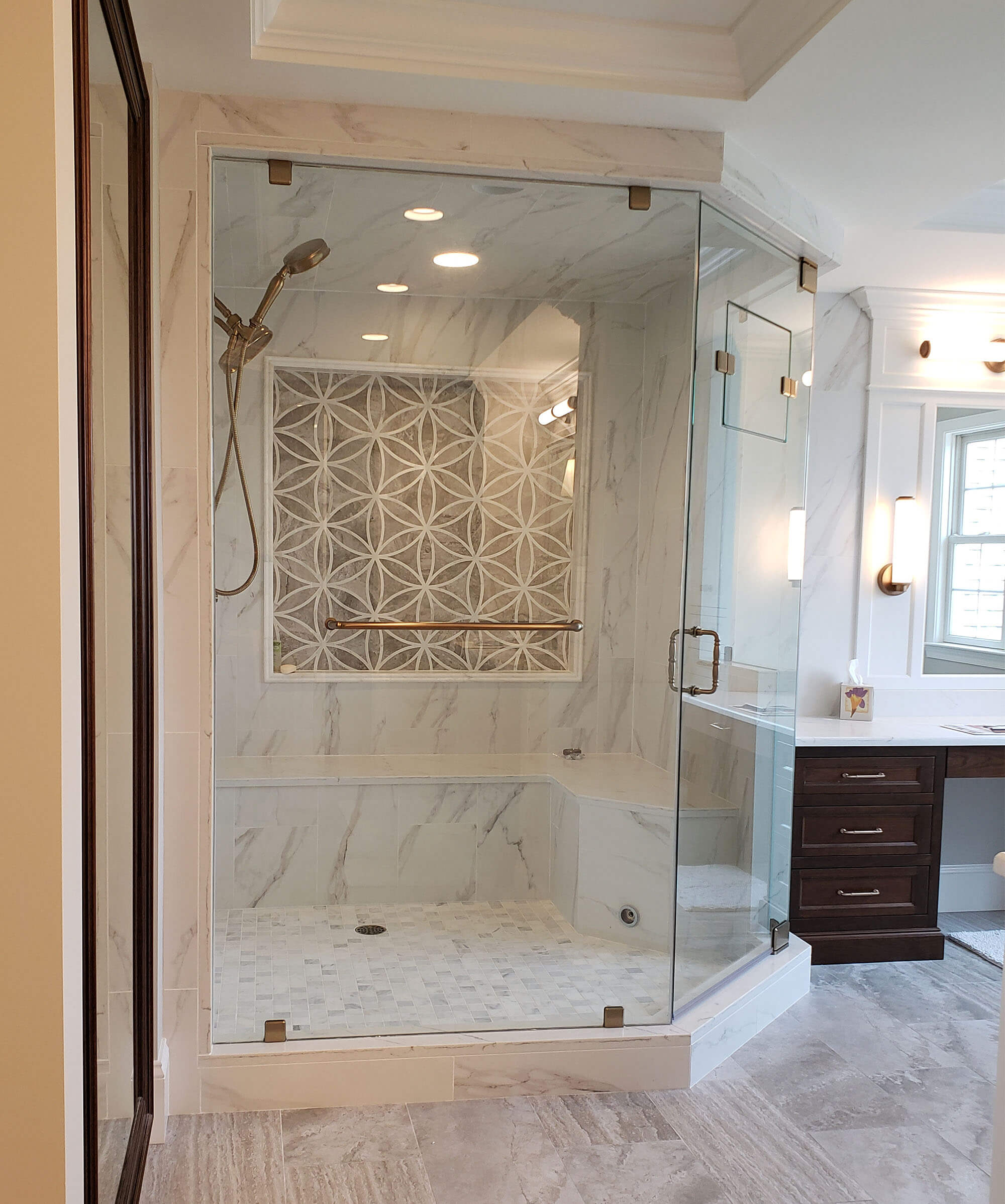 Shower with frameless glass walls and doors
